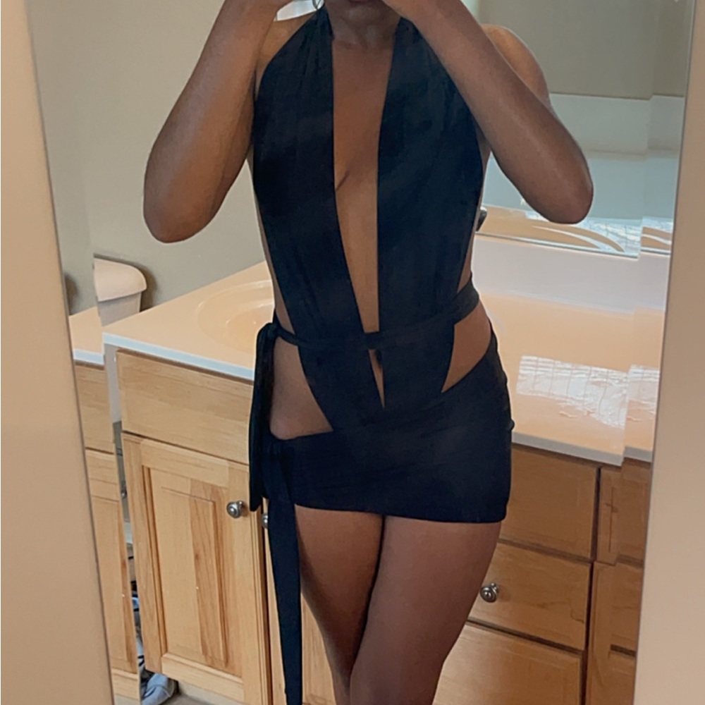 Bathing suit in the color black size small.